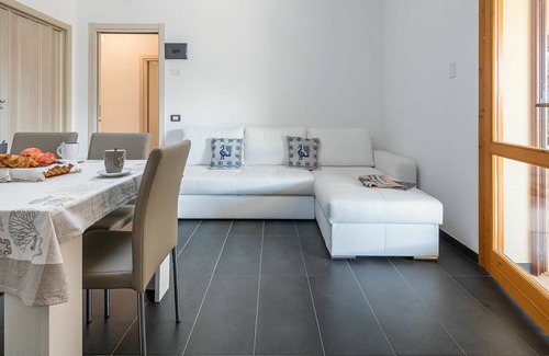 Alghero Apartment | Lovely apartment for 8 guests with A/C, WIFI, TV, terrace and parking