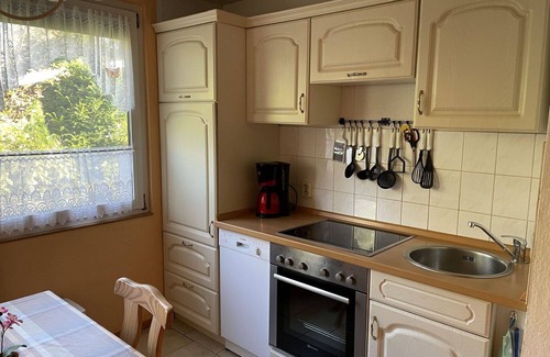 Dobbertin House | Lovely apartment in villa for 4 guests with TV, terrace, pets allowed and parking