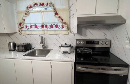 Montreal Apartment | Lovely half basement Apt near highway