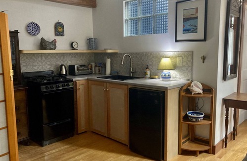 Brunswick Apartment | Lovely intown cottage close to college, shops, coast, in leafy, tranquil setting