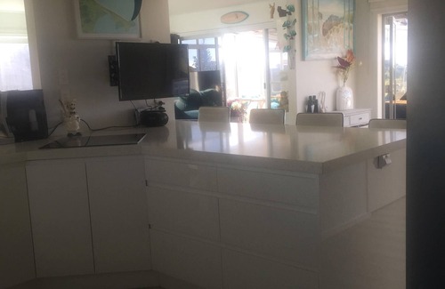 Waihi Beach House | Lovely sunny home with beach views to the front and county views at the back.