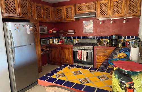 El Caloso Condo | Lush private courtyard and patio, 2 bd 2 bath,short walk to market & Old Town.