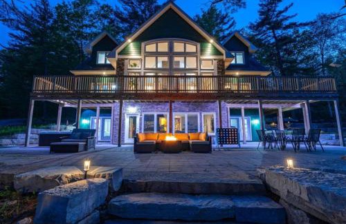 Buckhorn House | LUX Lakefront Sleeps18 Pickleball HotTub Sauna Gym Arcade Basketball Volleyball