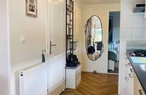 Lathum Ski Chalet | LuxChalet vacation home ELLA view on Ijssel in vacation park Pool Strand Holland