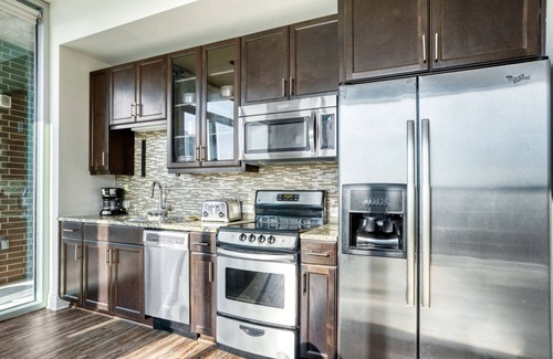 Waller Creek District Apartment | Luxe Downtown 1BR w/Gym, Deck & W/D, walk to 6th St bars, by Blueground