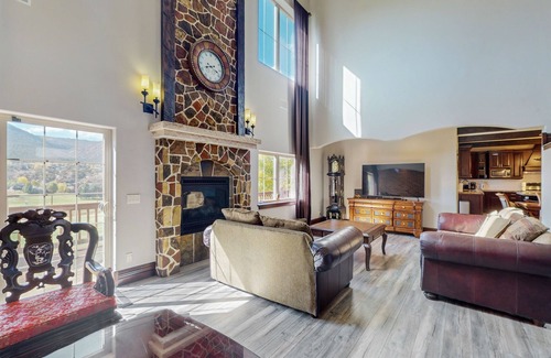 Gypsum House | Luxe home on Gypsum Creek Golf Course with fireplace and mountain views
