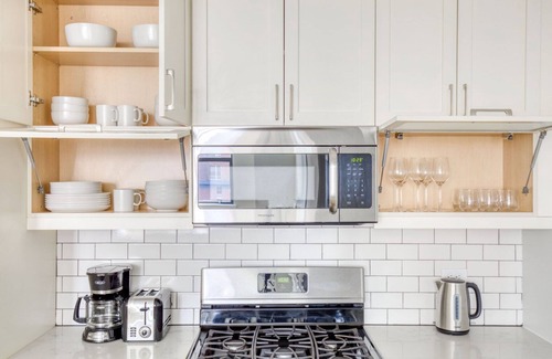 Historic Downtown Apartment | Luxe Jersey City 1BR w/Doorman, Gym & W/D, nr Shuttle, by Blueground