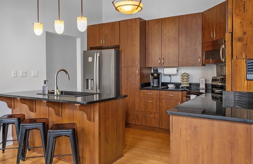 Wholesale District Apartment | Luxe Loft Downtown Su