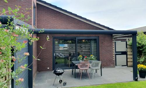 Dirkshorn House | Luxe zomerwoning met omheinde tuin voor hond en kinderen