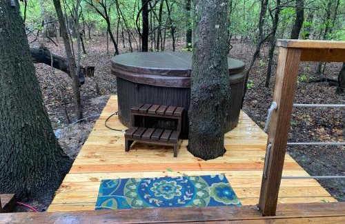 Dennis House | Luxurious African tent wwaterfall on the Brazos River! 350 acres! Tubing! Petting Zoo!