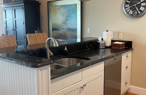 Traverse City Condo | Luxurious Direct Beachfront Condo #327-Close to Downtown.
