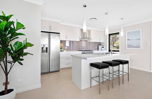 Shell Cove House | Luxurious Home with Heated Pool & Marina View