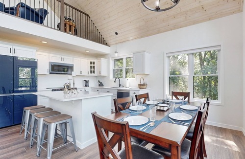 Eastman House | Luxurious home with hot tub, electric fireplace, and stunning views