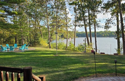 Pembine Cabin | Luxurious Northwoods Log Lake house with over 500ft of lake frontage on 15 acres