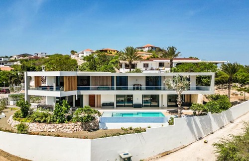Bisento Villa | Luxury 12-Guest Villa in Gated Community with Pool, Ocean View & Private Beach Access