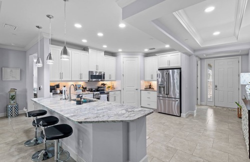 Naples Condo | Luxury 1st Floor Coach Home, Esplanade Golf, Tennis, Pickleball & Pools