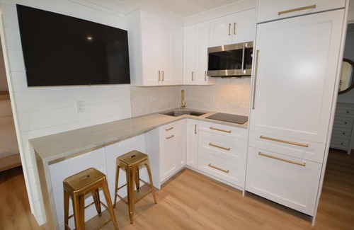 Avalon Condo | Luxury Beach Block Condo with a heated pool on site!