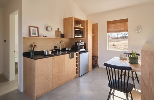 Stonewall Cabin | Luxury cabin in the center of the Texas Wine Country; large private porch w/hot tub, gas grill and fire pit; pet friendly