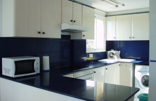 Sant Carles de la Rapita Apartment | Luxury urbanization facing the sea, pool and garage