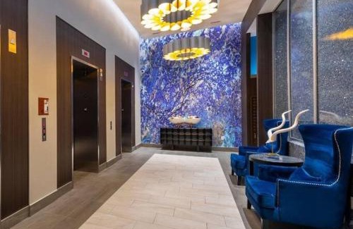 Midtown Apartment | Luxury Highrise in Midtown - Skyline Views and Chic Decor