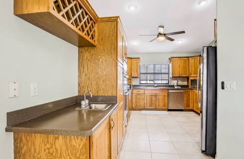 Marineland Acres House | Luxury home with a pool, enclosed yard, grill, washer/dryer & central AC