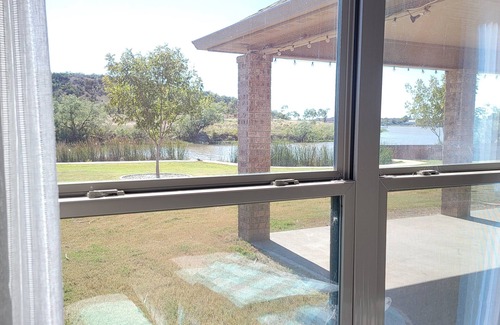 San Angelo House | Luxury lake front retreat! Family and pet friendly with fishing access!