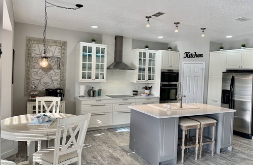 Buena Ventura Lakes House | Luxury Lake Home near parks and MCO airport. Private Pool and spa. Themed rooms.