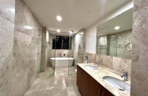 Chhatarpur Apartment | luxury master bedroom with bathtub n private entry