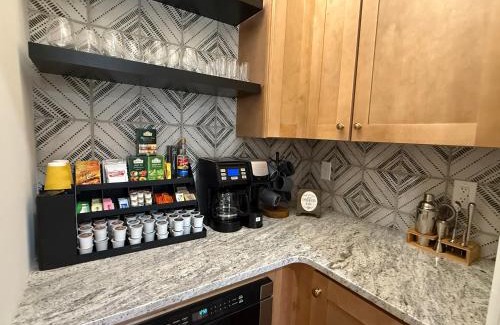Gastonia House | Luxury New Construction Cottage with fireplace, office, and covered deck