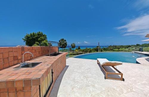 La Cienaga Villa | Luxury Oceanfront Villa with Heated Pool, Jacuzzi, AC, BBQ, Starlink Wi-Fi, Chef's Kitchen, Staff Included, Mountain Views, Near El Quemaito, San Rafael, and Los Patos Beach