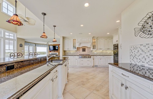 Southend House | Luxury Ocean Front Mansion with Heated Pool, Elevator, Grill and Suites Galore