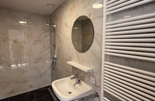 Goirle Apartment | Luxury retreat with modern décor, parking, and fast WiFi close to nature trails. Sleeps four guests.