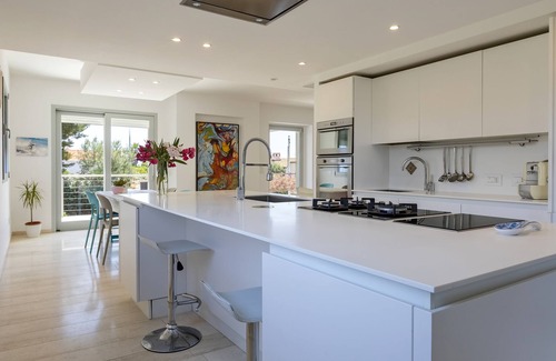 Fertilia Villa | Luxury Seafront Villa with Rooftop Pool & Stunning Sea Views
