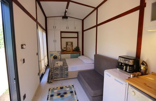 Gumusluk RV Rental | LUXURY TINY HOUSE 50 METERS TO SEA & GARDEN-BAR-RESTAURANT