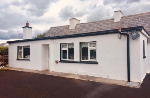 Quilty House | Maisie's Seaside Cottage
