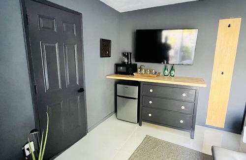Coral Ridge Isles House | Maison Gris exclusive resort style paradise with a heated pool.