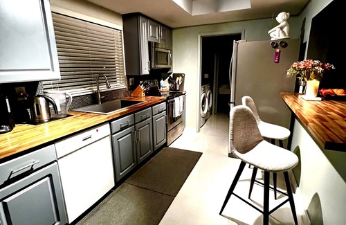 Coral Ridge Isles House | Maison Gris exclusive resort style paradise with a heated pool.