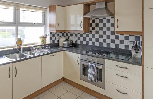 Doonbeg House | Matthews Cottage Doonbeg sleeps 6 by Trident Holiday Homes