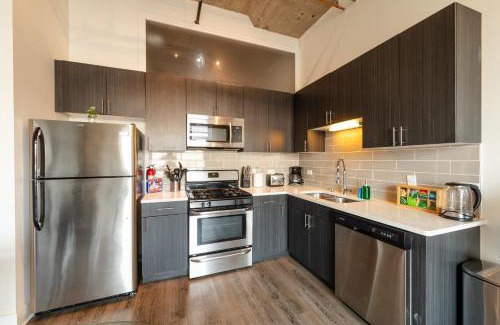 Near South Side Apartment | McCormick Place 2BR Suite with Patio, Skyline View and Optional Parking Sleeps 6 Near Soldier Field and Grant Park