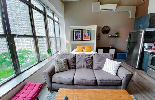 Near South Side Apartment | McCormick Place Designer Studio with optional parking for up to 4 guests