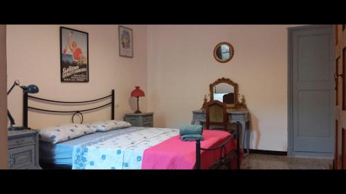 Pieve di Teco Apartment | Medieval Pieve, holiday home with garden, WiFi & parking