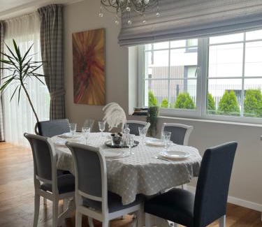 Klaipeda Villa | Melnrage Beach cozy apartments & terrace - pine view sea entry