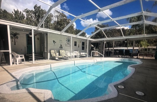 Weeki Wachee Gardens House | MERMAID MANOR heated POOL! Waterfront, BOAT DOCK, KAYAKS, paddle Weeki Wachee