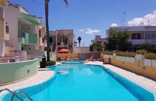 Torre dell'Orso Apartment | Merope terrace in residence with pool