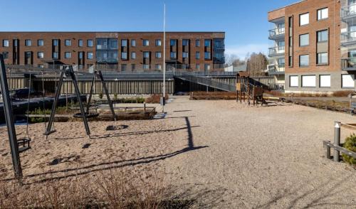 Espoo Apartment | Metsämansikan helmi