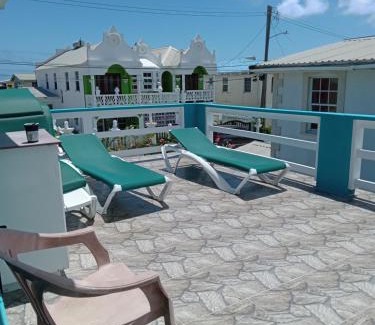 Charnocks Apartment | Michand Guest Apartments- Cozy one or two bedroom- 5 walk minutes from airport 10 mins drive to Oistins or beach