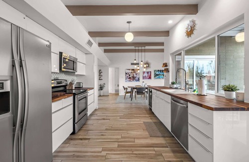 Village Grove House | Mid-Century Marvel: Poolside Patio w/Spa & Bocce