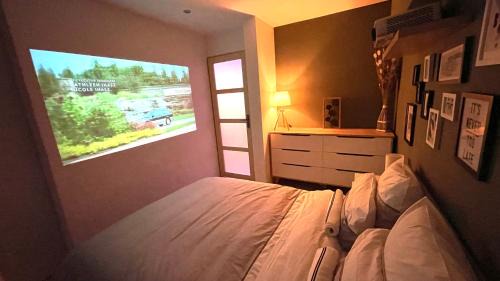 Dole Apartment | Mille et une nuit, appartement classé 3 étoiles en RDC avec exterieur et parking