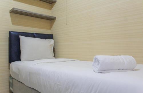 Rawasari Apartment | Minimalist 2BR Green Pramuka City Apartment near Shopping Mall By Travelio