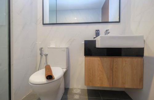 Semanggi Apartment | Minimalist and Homey 1BR at Ciputra World 2 Apartment By Travelio